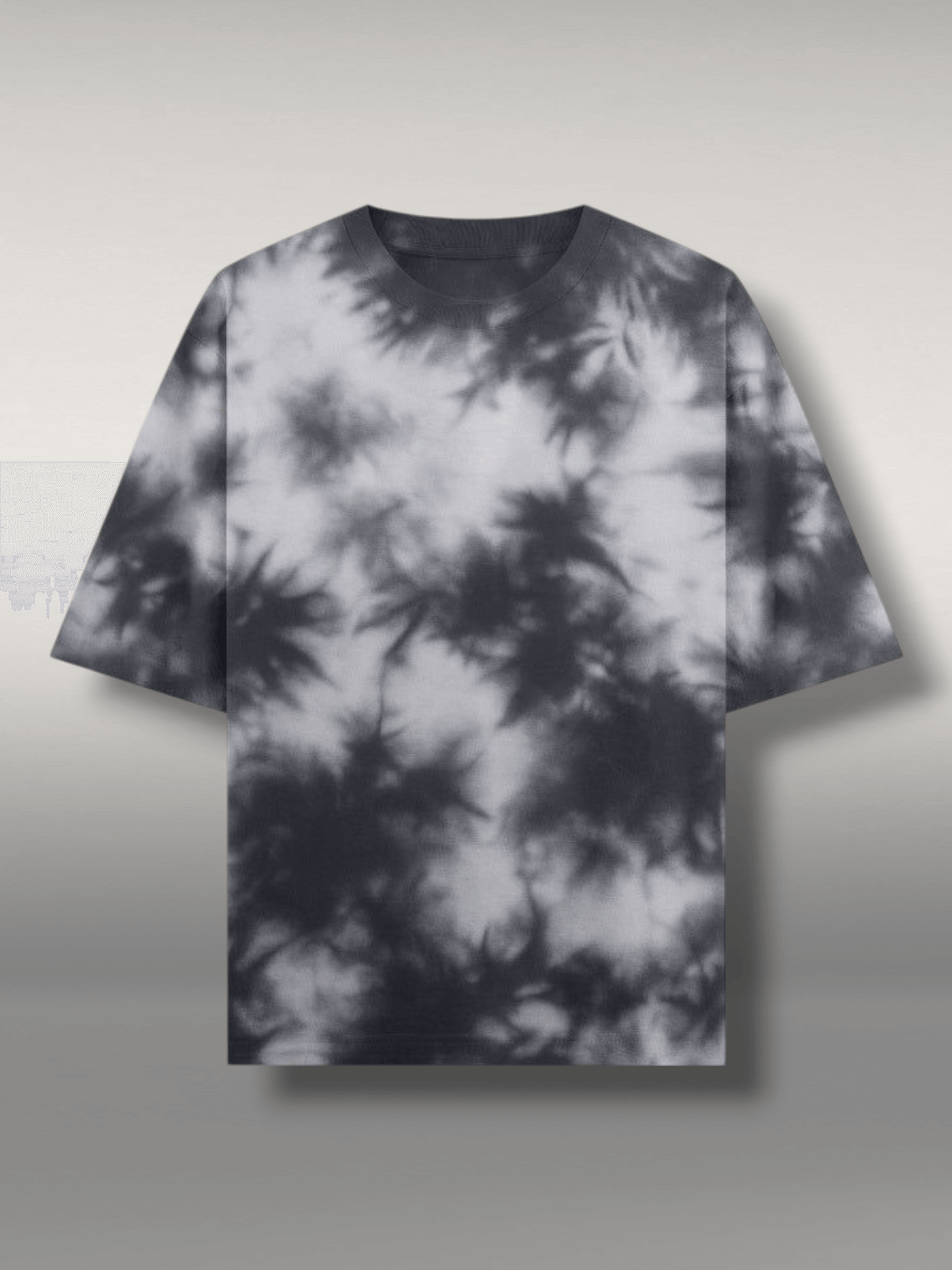 Oversized tie-dye tee in black and grey, made from premium French terry cotton for comfort.