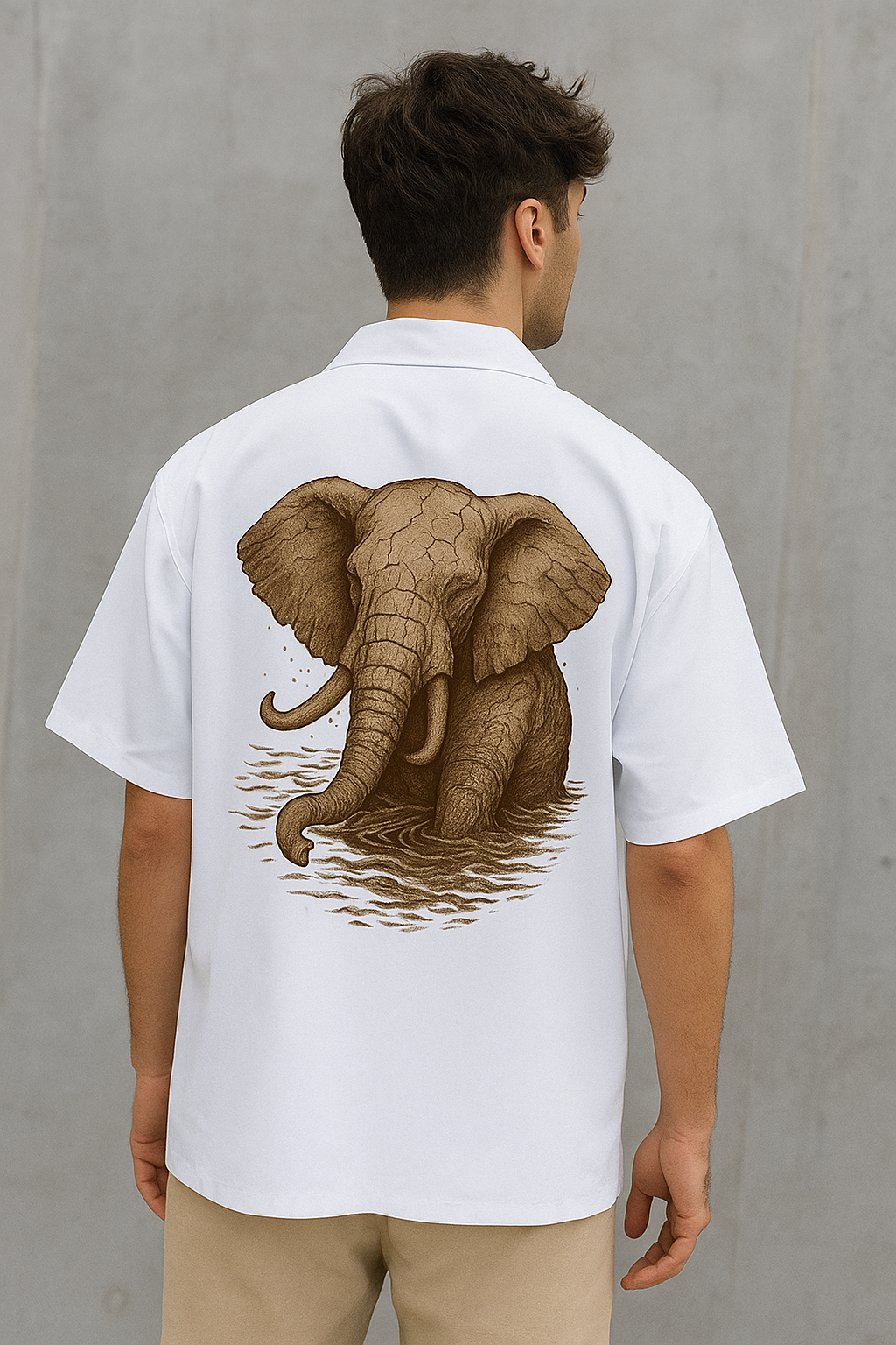 model wearing elephant in mud on back in white oversized premium luxe cotton Shirt
