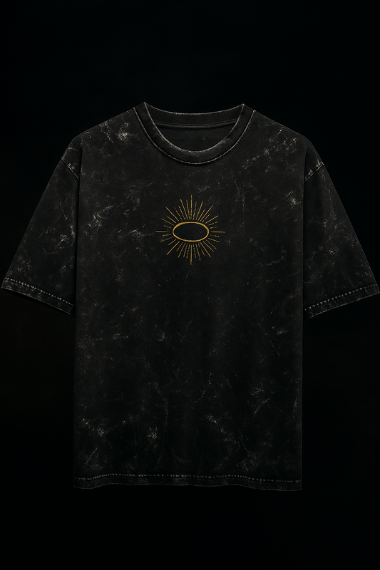 Black acid wash oversized t-shirt with celestial graphic, featuring a glowing halo design on a heavyweight cotton fabric.