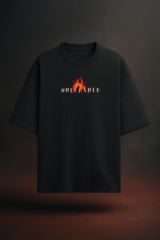 UNLEASHED on front of black oversized french terry cotton t-shirt 