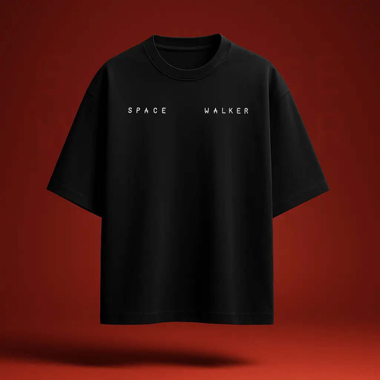 Oversized black t-shirt with 'SPACE WALKER' print, made from premium French Terry cotton for comfort and style.